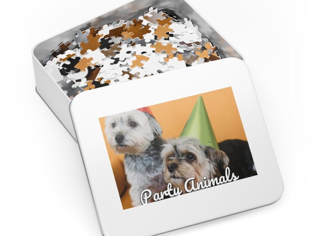 A photo puzzle gift in its tin, showing "Party Animals" over two dogs in party hats